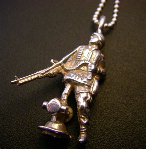 burberry brit polo soldier pendant sterling silver and 14k gold